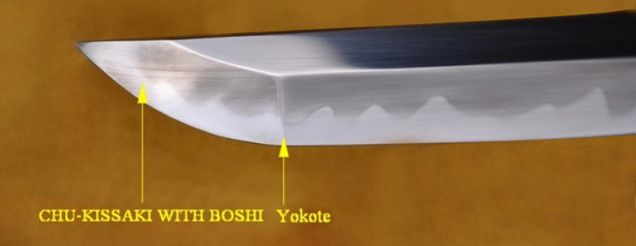 Close-up of a Japanese sword kissaki showing the hamon and boshi temper pattern Close-up of a Japanese sword kissaki showing the hamon and boshi temper pattern