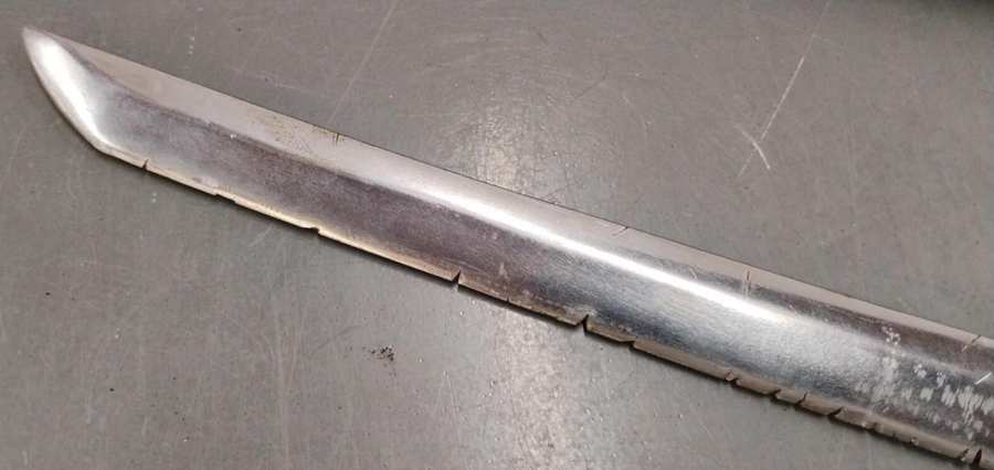 Katana blade edge damage caused by impact with another hard sword Katana blade edge damage caused by impact with another hard sword