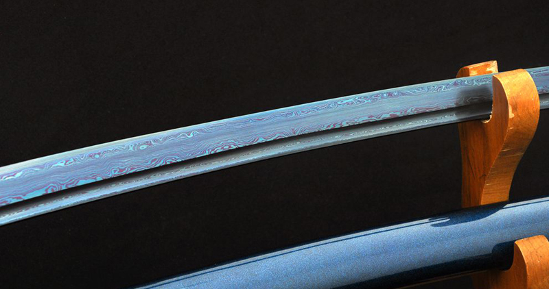 Blue blade katana sword with detailed Japanese style fittings Blue blade katana sword with detailed Japanese style fittings