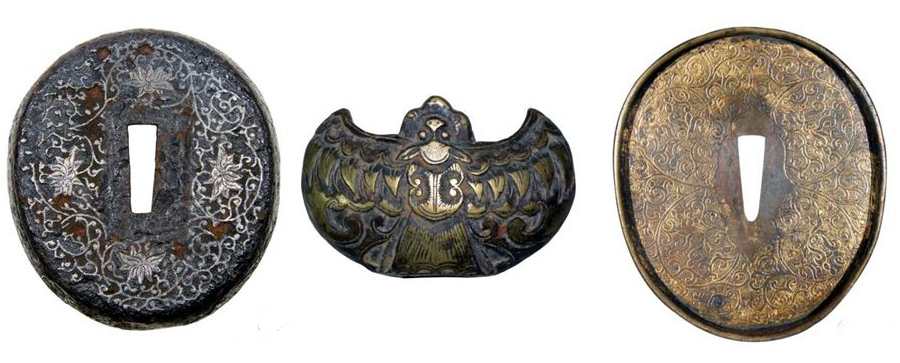Ancient Japanese sword tsuba with dragon design and gold decoration Ancient Japanese sword tsuba with dragon design and gold decoration