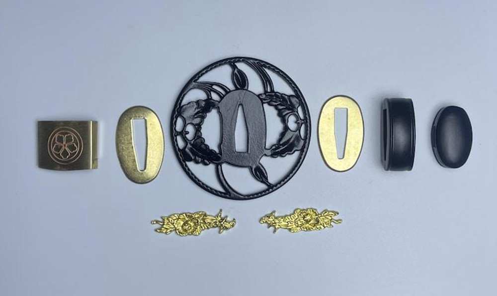 Exquisite Japanese katana tsuba sword guard with gold decoration Exquisite Japanese katana tsuba sword guard with gold decoration