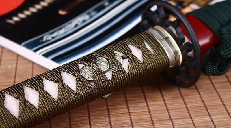 Finished katana handle showing traditional ito wrapping and diamond pattern