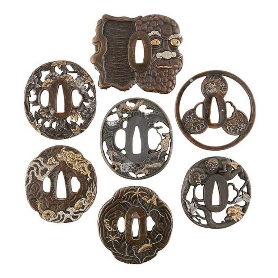 Different styles and shapes of traditional Japanese sword tsuba Different styles and shapes of traditional Japanese sword tsuba