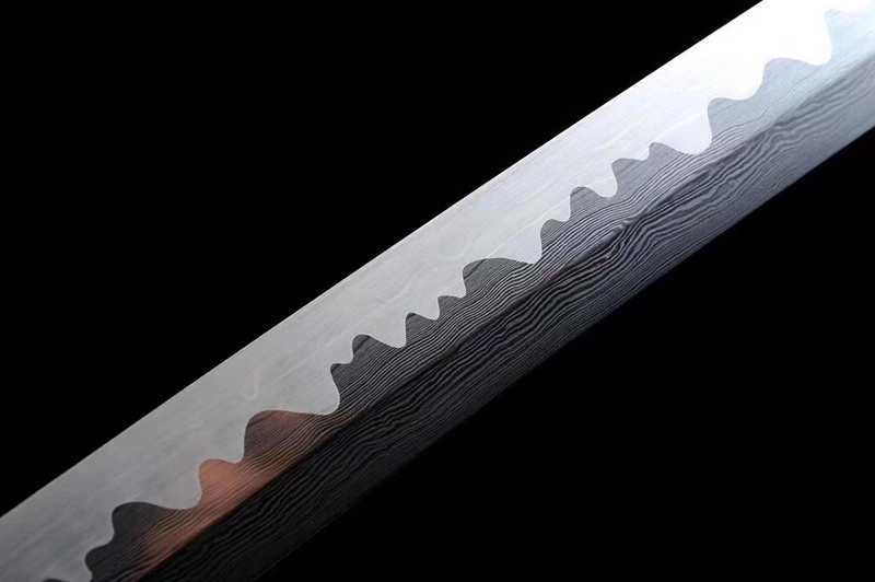 Handmade Damascus katana sword with folded steel blade pattern Handmade Damascus katana sword with folded steel blade pattern