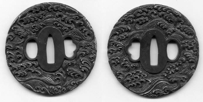Samurai sword tsuba close up showing traditional Japanese sword guard design Samurai sword tsuba close up showing traditional Japanese sword guard design