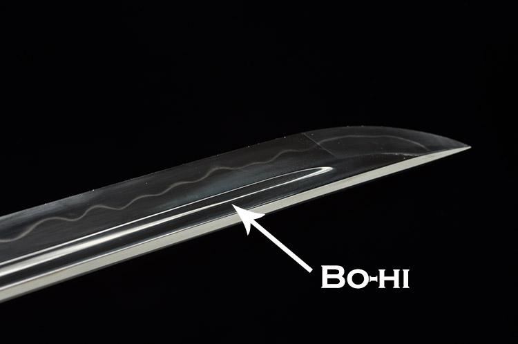Japanese katana blade without Bo-Hi showing a smooth surface and visible hamon.