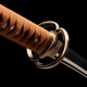 Hand Forged T10 Steel Katana with Genuine Midare Hamon, Gold Musashi Tsuba and Black Piano Finish Saya Hand Forged T10 Steel Katana with Genuine Midare Hamon, Gold Musashi Tsuba and Black Piano Finish Saya